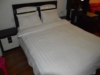 Yangguang Xingzuo Apartment Hotel Chongqing Exterior foto